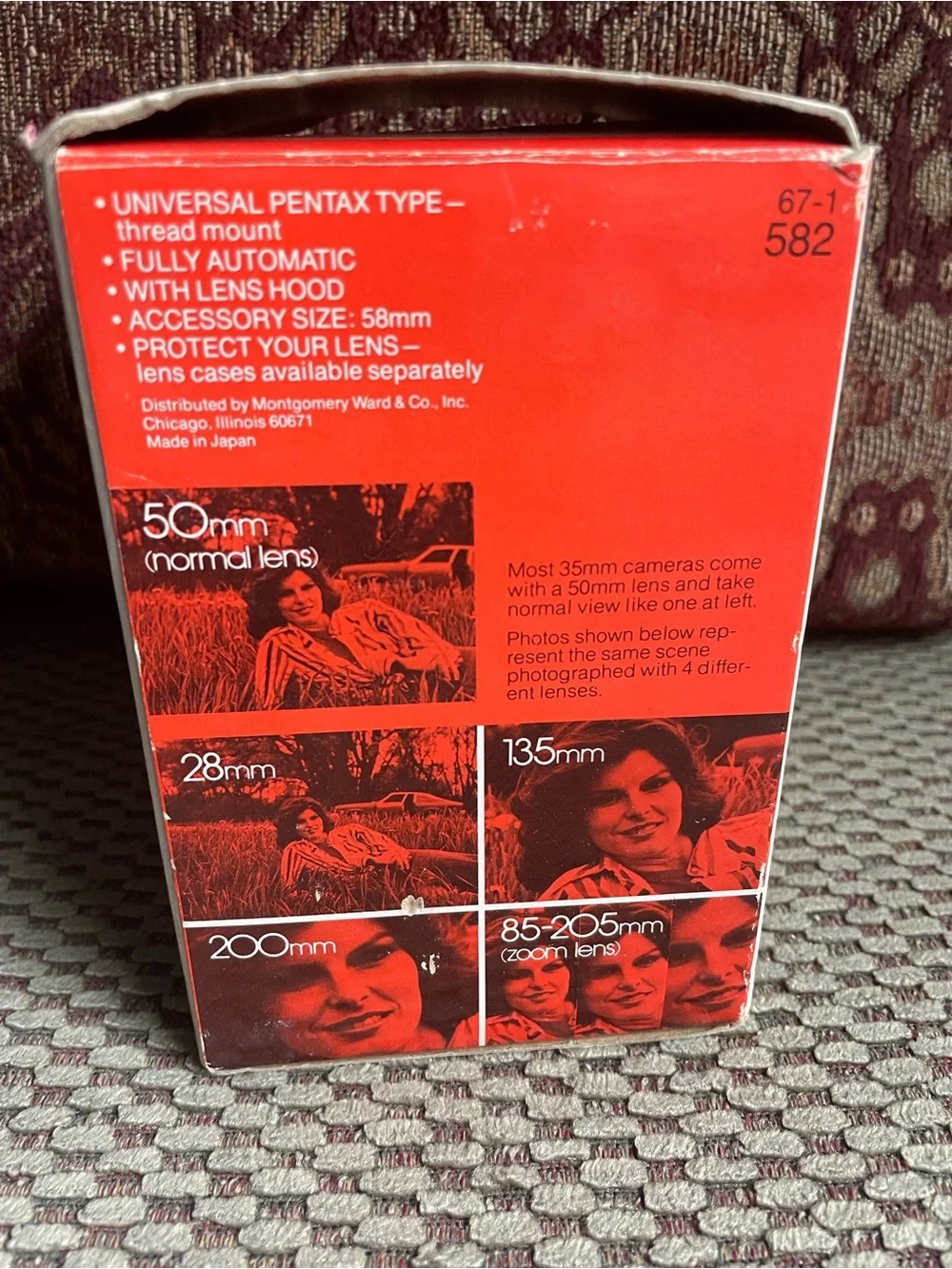 135mm f/2.8 Telephoto Lens in Pink Packaging